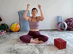 Aurora Willows leads a yoga class for mature women