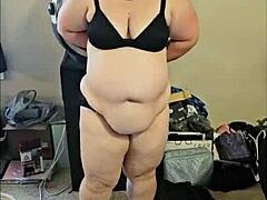 Amateur BBW shows off her moves in a striptease routine